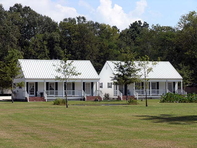 Guest cottages at Poche Plantation. Property photograph from Poche Plantation’s gallery.